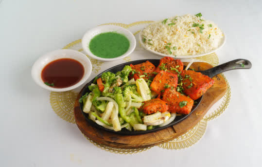 Tandoori salmon prepared for an Indian catering order
