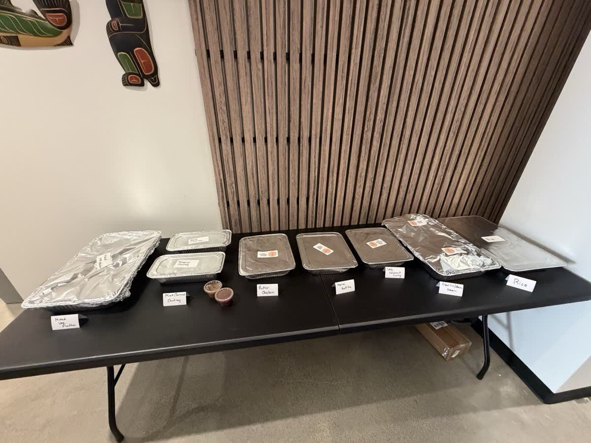 Vegetarian Indian catering trays laid out for serving